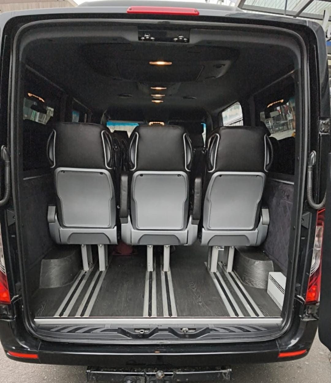 Switzerland luggage transfer service with professional chauffeur delivering luggage between Swiss hotels, airports, train stations, and luxury destinations